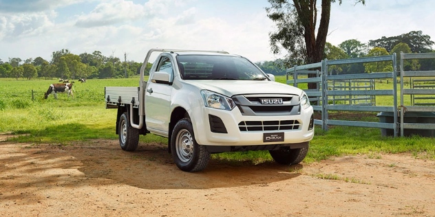 A white 2018 Isuzu D-Max parked on a farm