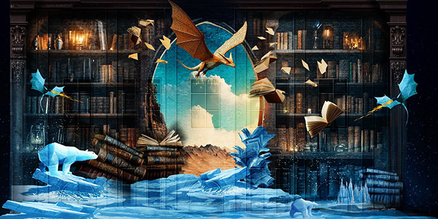 Lights projected onto a building showing a fantasy scene